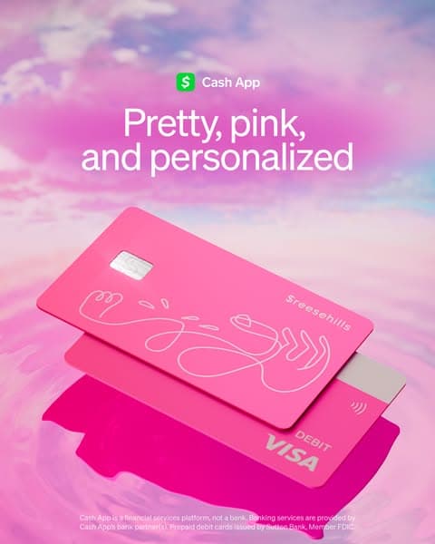 A pink Cash App Visa debit card floats over a reflective pink water surface under a soft pink sky, with white text above reading "Pretty, pink, and personalized" and a small Cash App logo above the text.