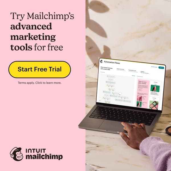 Advertising banner with a pink background on the left and a laptop on the right, showing a hand using the laptop; the headline reads "Try Mailchimp’s advanced marketing tools for free" and the yellow CTA button says "Start Free Trial," with smaller text below that says "Terms apply. Click to learn more.