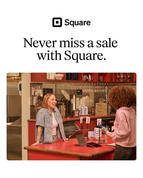 Square logo above the headline "Never miss a sale with Square." with a photo below showing two women smiling at a red counter in a cozy shop setting, one holding a phone; no CTA text visible.